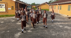 Some of the children on their way to school. The children go to the public school in Mkuranga so tha